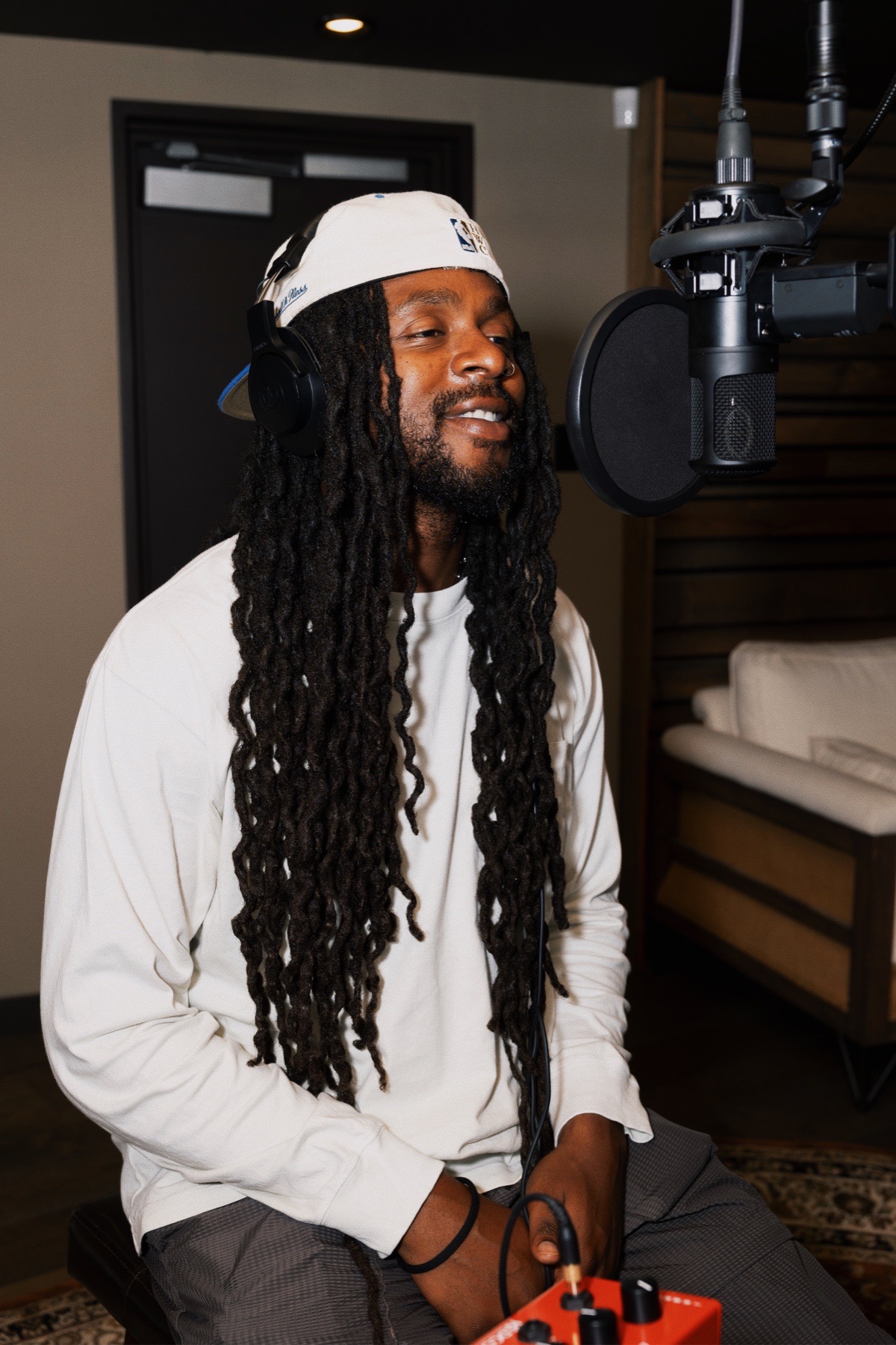 An artist recording vocals during a BLANC session
